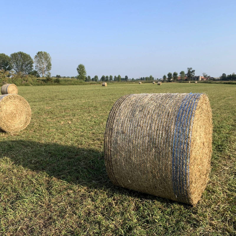 Rete per rotopressa "Start +" realizzata in polietilene a maglia stretta indicata per l'imballaggio di rotoballe